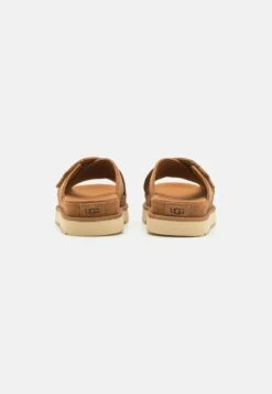 Ugg GOLDENSTAR CROSS SLIDE - Pantolette Flach - Chestnut -Ugg 8c207857bd884b8fb297bc757d91d915