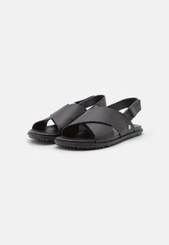 Ugg SOLIVAN SLINGBACK - Riemensandalette - Black -Ugg f7f7967f44ae4e89b6642a22afe35c2d